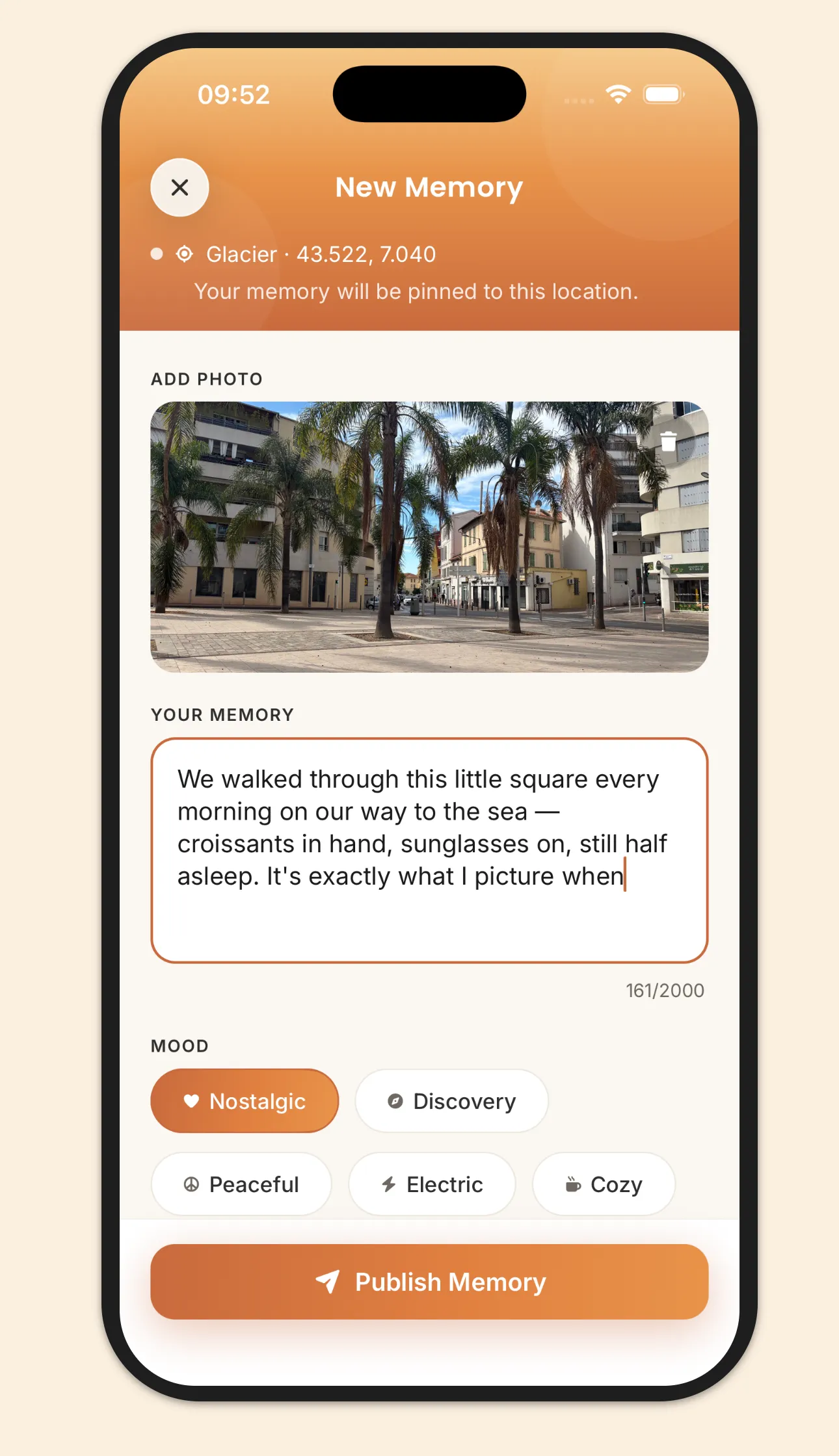 The New Memory screen — a photo of a palm-lined square, a few lines about walking to the sea, and Nostalgic picked as the mood